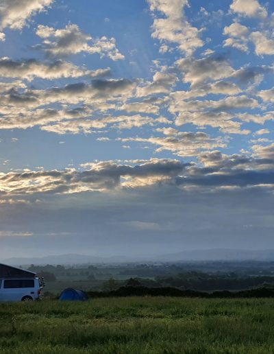 Camper van on the Top Field with mackerel sky